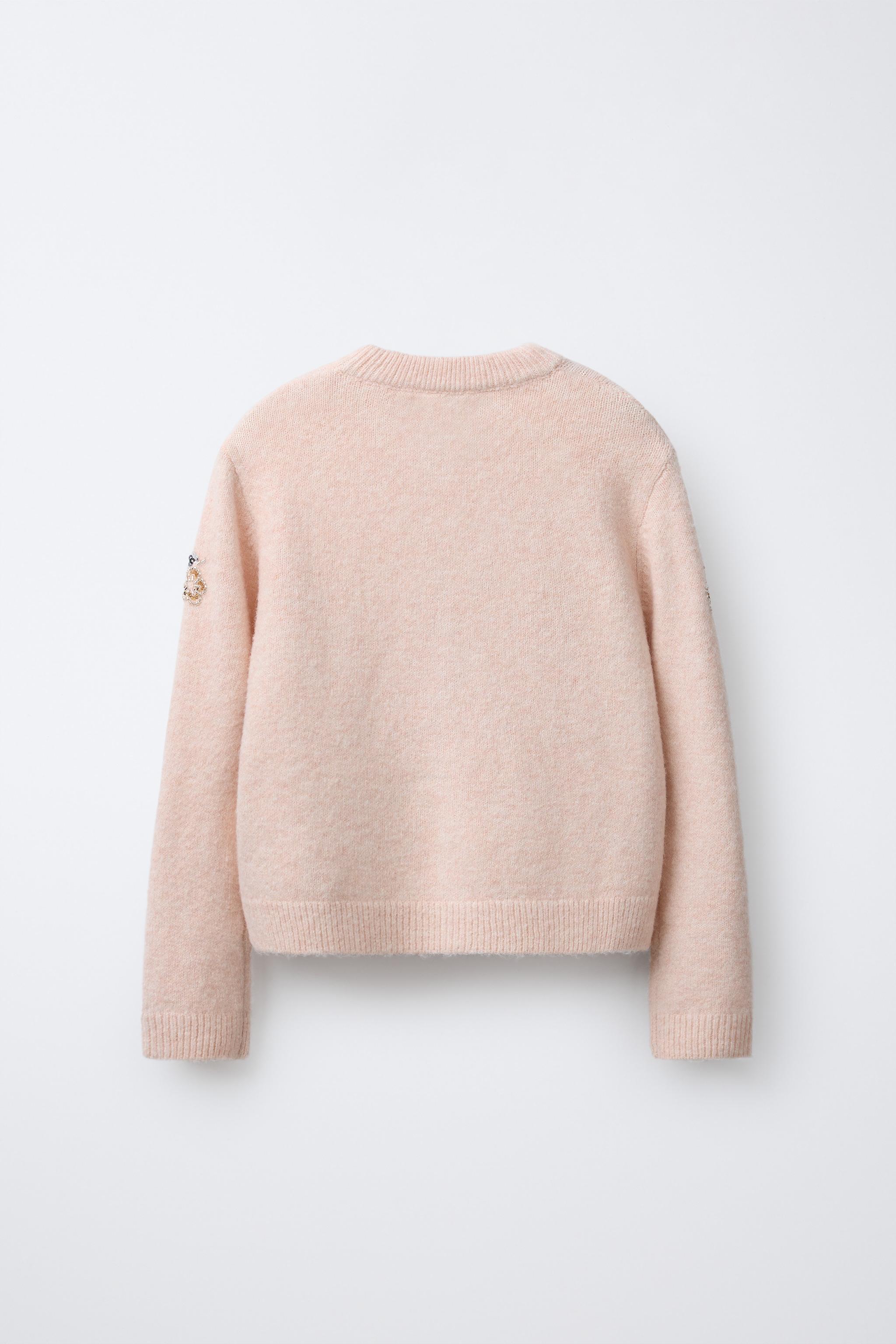 GILET EN MAILLE AVEC FLEURS FANTAISIE